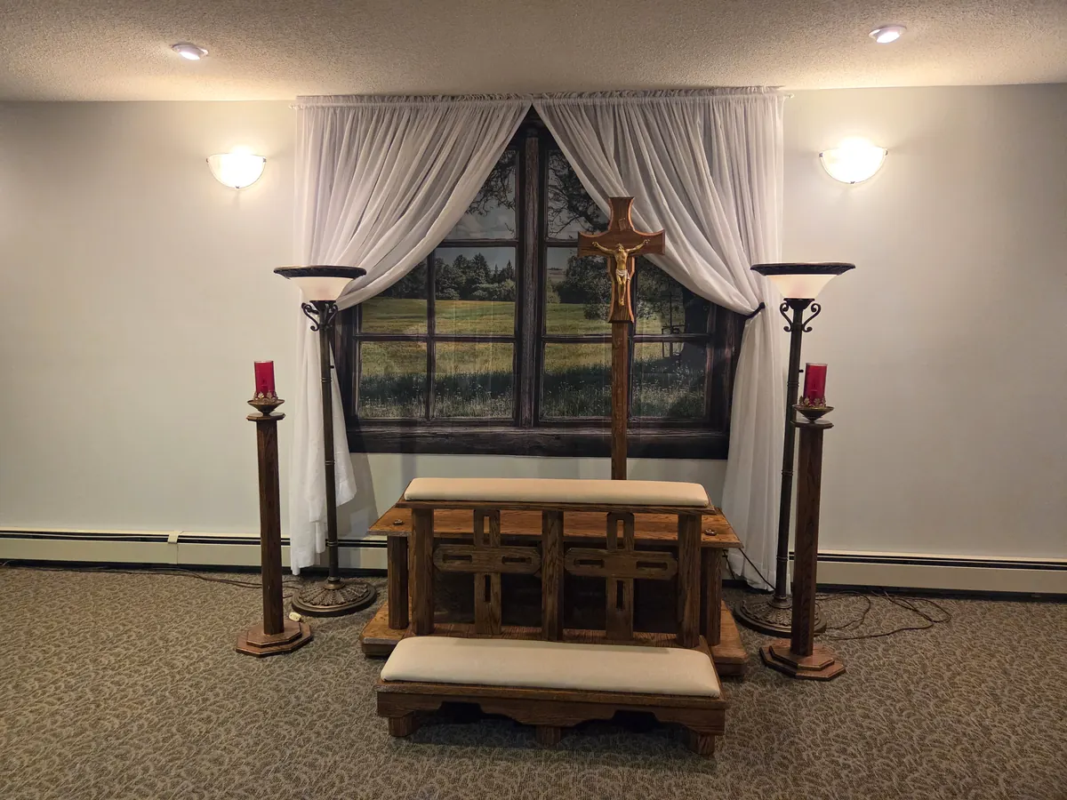 The altar and kneeler in the chapel at West Prince Funeral Home